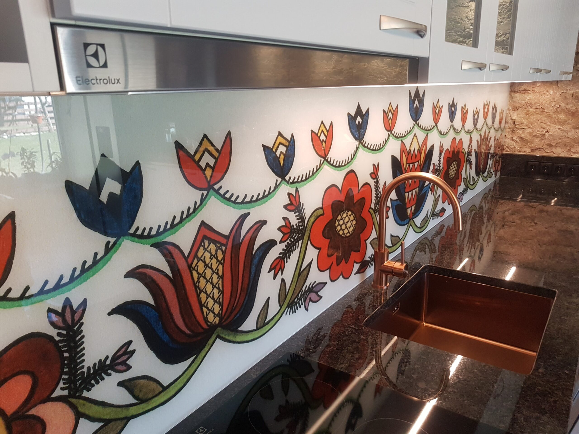 Kitchen glass splashback with a digitally printed folk pattern